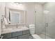 Bathroom featuring glass shower, granite countertop and a framed mirror at 2123 Boatwright Rd, Johns Island, SC 29455