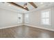 Spacious bedroom featuring tray ceilings, recessed lighting, and hardwood floors at 2123 Boatwright Rd, Johns Island, SC 29455