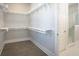 Spacious walk-in closet with shelving and an access door to the bathroom at 2123 Boatwright Rd, Johns Island, SC 29455