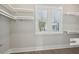 Well-organized closet with shelving and natural light from the window at 2123 Boatwright Rd, Johns Island, SC 29455