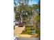 Gravel driveway with a red pickup truck at 2123 Boatwright Rd, Johns Island, SC 29455
