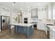 Kitchen with stainless steel appliances, center island, and custom white cabinets at 2123 Boatwright Rd, Johns Island, SC 29455