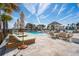 A luxurious pool area with comfortable lounge chairs and a stylish gazebo provides relaxation and leisure at 2123 Boatwright Rd, Johns Island, SC 29455