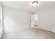 Spacious bedroom with neutral carpet, featuring a window and a doorway at 2181 Blue Bayou Blvd, Johns Island, SC 29455