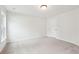 Large, carpeted bedroom with ample natural light from a window, freshly painted and move-in ready at 2181 Blue Bayou Blvd, Johns Island, SC 29455