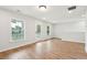 Upstairs bonus room with wood flooring, natural light, and outside views at 2181 Blue Bayou Blvd, Johns Island, SC 29455