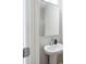 Pedestal sink and modern framed mirror at 221 Abercom Place Dr, Moncks Corner, SC 29461