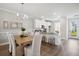 Bright kitchen with stainless steel appliances and an adjacent dining area at 221 Abercom Place Dr, Moncks Corner, SC 29461