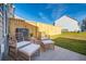 Cozy patio area with wicker furniture and wooden fence at 221 Abercom Place Dr, Moncks Corner, SC 29461