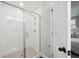 Modern walk-in shower with glass door, white subway tile, and a handheld shower head at 221 Abercom Place Dr, Moncks Corner, SC 29461