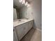 Bathroom featuring a double sink vanity with white cabinets, countertop space and chrome fixtures at 2225 Blue Bayou Blvd, Johns Island, SC 29455
