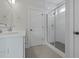 Bathroom featuring a glass enclosed shower, marble counter tops, tile backsplash, and modern fixtures at 2225 Blue Bayou Blvd, Johns Island, SC 29455