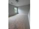 Cozy bedroom featuring carpet flooring, neutral walls, and a window providing natural light at 2225 Blue Bayou Blvd, Johns Island, SC 29455
