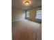 Bedroom featuring two large windows providing an abundance of natural light and carpet flooring at 2225 Blue Bayou Blvd, Johns Island, SC 29455