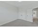 A spacious bedroom features double door closets and neutral carpet at 2225 Blue Bayou Blvd, Johns Island, SC 29455