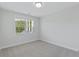 A cozy bedroom features a window view with natural light enhancing its tranquil atmosphere at 2225 Blue Bayou Blvd, Johns Island, SC 29455