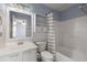 The bathroom has neutral wall paint, white fixtures, and a shower-tub combo at 228 Two Pond Loop, Ladson, SC 29456
