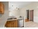 The kitchen features stainless steel appliances, laminate countertops, and tile flooring at 228 Two Pond Loop, Ladson, SC 29456
