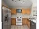 Well-lit kitchen features stainless steel appliances and ample counter space at 228 Two Pond Loop, Ladson, SC 29456