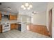Kitchen view with breakfast bar and a seamless flow into the living area at 228 Two Pond Loop, Ladson, SC 29456