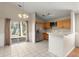 Eat in kitchen with tile floors, stainless steel appliances and breakfast bar at 228 Two Pond Loop, Ladson, SC 29456
