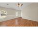 Bright living room boasts large windows and a ceiling fan at 228 Two Pond Loop, Ladson, SC 29456