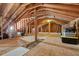 A spacious attic with exposed wooden beams, ready for customization and storage at 2786 Parkers Landing Rd, Mount Pleasant, SC 29466
