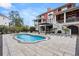 Inviting outdoor space with custom pool, covered outdoor kitchen and bar, and mature landscaping at 2786 Parkers Landing Rd, Mount Pleasant, SC 29466