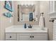 Bright bathroom featuring white cabinetry, a wide mirror, and modern fixtures for a clean and updated feel at 2786 Parkers Landing Rd, Mount Pleasant, SC 29466