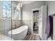 Bright bathroom with soaking tub and glass shower at 2786 Parkers Landing Rd, Mount Pleasant, SC 29466