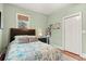 Well-lit bedroom featuring a comfortable bed, natural light, and a closet for ample storage at 2786 Parkers Landing Rd, Mount Pleasant, SC 29466