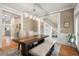 Stylish dining room with modern lighting and ample seating at 2786 Parkers Landing Rd, Mount Pleasant, SC 29466