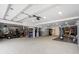 Spacious garage area with epoxy flooring and a golf cart parked at 2786 Parkers Landing Rd, Mount Pleasant, SC 29466