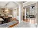 Open-concept dining and living area with hardwood floors, and neutral color palette at 2786 Parkers Landing Rd, Mount Pleasant, SC 29466