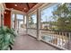 Relaxing covered porch with string lights overlooking the backyard pool at 2786 Parkers Landing Rd, Mount Pleasant, SC 29466