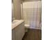 Well-lit bathroom features a sink, toilet, shower, and vanity with ample counter space at 2905 Sweetleaf Ln, Johns Island, SC 29455