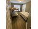 Inviting bedroom with a bunk bed, single bed, and window providing natural light at 2905 Sweetleaf Ln, Johns Island, SC 29455