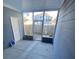 Enclosed back patio featuring ample space and a view of the fenced backyard at 2905 Sweetleaf Ln, Johns Island, SC 29455