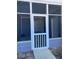 Screened porch showing an exterior view to a small backyard with fence at 2905 Sweetleaf Ln, Johns Island, SC 29455