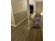 Open staircase features wood floors, a light-filled area, and access to multiple levels at 2905 Sweetleaf Ln, Johns Island, SC 29455