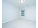 A vacant bedroom with light gray carpet, white walls, and one window at 2912 Siebold Dr, North Charleston, SC 29406