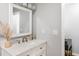 Bright bathroom with a modern vanity, a stylish mirror, and ample counter space at 2916 Marginal Rd, Charleston, SC 29414