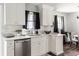Cozy dining area adjacent to a stylish kitchen with white marble countertops at 2916 Marginal Rd, Charleston, SC 29414
