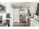 Well-lit kitchen featuring white countertops, stainless steel appliances, and ample storage at 2916 Marginal Rd, Charleston, SC 29414