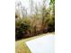 Backyard area with a view of a black fence and mature trees at 315 Flyway Rd, Goose Creek, SC 29445