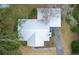 Aerial view showcases roof, driveway, backyard and surrounding mature landscaping at 3589 Walter Dr, Johns Island, SC 29455