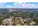 Aerial view of home with river in background, nestled amongst lush green trees at 3589 Walter Dr, Johns Island, SC 29455