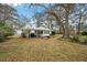 Large backyard with a fire pit and plenty of room for entertaining guests at 3589 Walter Dr, Johns Island, SC 29455