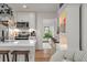 Bright kitchen featuring a large island, stainless appliances, and a butler's pantry at 3589 Walter Dr, Johns Island, SC 29455