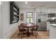 Bright eat-in kitchen features modern stainless appliances and custom cabinetry at 3589 Walter Dr, Johns Island, SC 29455